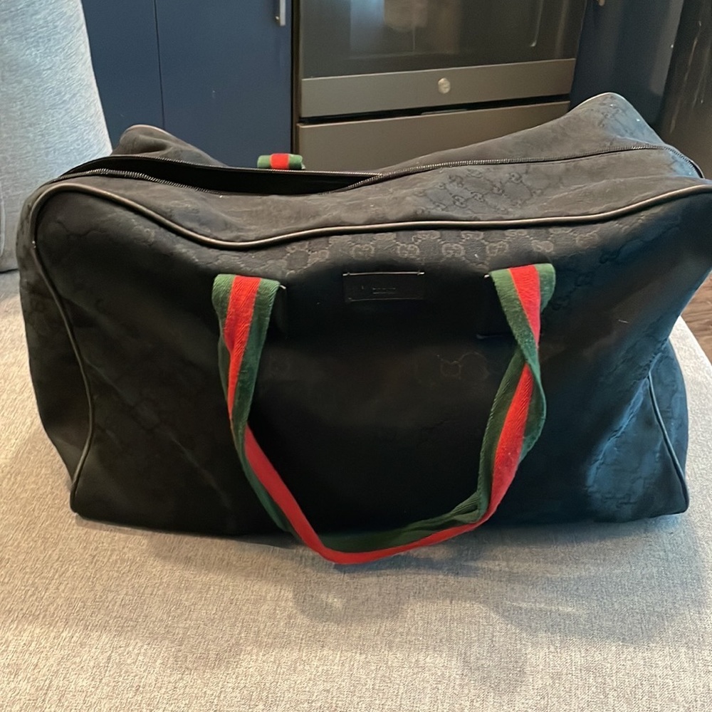 Gucci duffel bag (new without tags)